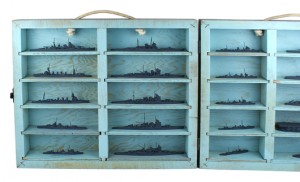 Wooden case containing 20 Japanese model ships from around World War II, made by the Comets Metal Co. ($793). Mohawk Arms Inc. image