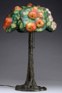 Pairpoint art glass lamp, Apple Blossom pattern, Tree Trunk base, signed and stamped, $15,000. Morphy Auctions image