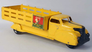 Coca-Cola stakebed truck with advertising, 21 inches long, est. $200-$400. Morphy Auctions image