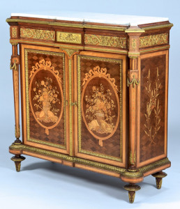 The sale included a number of warmly received French decorative arts. This Napoleon III marquetry inlaid cabinet with marble top and ormolu mounts stamped for Victor Paillard of Paris (1805-1886), sold for $14,260. Case Antiques Auction image