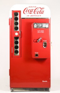 Mid-to-late 1950s Coca-Cola 10-cent vending machine by Vendo, beautifully restored and bright red. Price realized: $3,000. Ahlers & Ogletree image