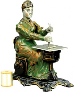 Cast-iron Woman at Sewing Machine, attributed to Sandt, rear lever activates head and hand motions when turned, provenance: Donal Markey Collection, est. $8,000-$12,000. Bertoia Auctions image