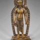 Heavy Tibetan polychrome bronze standing Lokeshwor, 27 1/4 in. high. Estimate: $5,000-$7,000. I.M. Chait Gallery/Auctioneers image