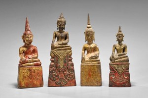 Four antique Southeast Asian carved wood Buddhas; all seated in half-lotus position with hands in ‘Earth Witness’ and serene expression. The tallest is 8 in. Estimate: $400-$600. I.M. Chait Gallery/Auctioneers image