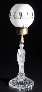 Boston & Sandwich frosted Madonna figural night-clock lamp in outstanding working condition, circa 1875. Morey collection. Price realized: $9,775. Jeffrey S. Evans & Associates image