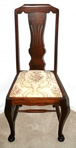 This stylized Queen Anne chair has a vase-shaped pierced splat. Why is it called splat?