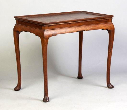 The top lot of the sale was this 18th century Virginia Queen Anne tray-top tea table with scalloped skirt and pad feet. Price realized: $299,000. Cottone Auctions image