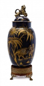 English cobalt porcelain vase and cover, late 19th century with gilt bird and butterfly decoration, 34 1/2 inches high. Estimate: $1,500-$2,500. Leslie Hindman Auctioneers