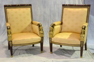 Pair of Empire-style gilt bronze bergères, 20th century, in the manner of Francois-Honore-Georges Jacob-Desmalter, French, 1770-1841, silk upholstered with gilt bronze mounts. Bunch Auctions image