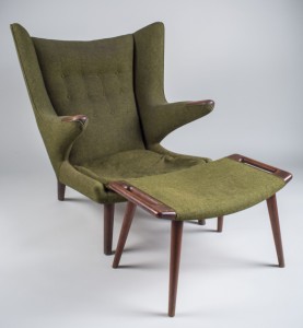 Hans Wegner Papa Bear chair and ottoman in original green wool upholstery. Price realized: $9,000. Capo Auction Fine Art and Antiques image