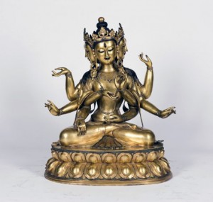 Large gilt bronze Buddha, seated in dhyanasana on a double-lotus base and crowned by a jeweled tiara surrounding the tall chignon. Length: 25in x width: 15in x height: 31in. Linwoods Auction image