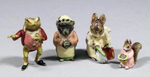 Four tiny Austrian cold-painted bronze Beatrix Potter figures, left to right, Jeremy Fisher, Hunca Munca, Mrs Tiggywinkle and Goody Tiptoes. They sold together for 340 pounds. Photo The Canterbury Auction Galleries
