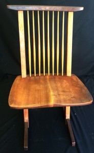 One of the six Nakashima conoid walnut chairs. B. Langston’s LLC image