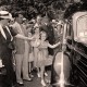 Shirley Temple leaving the White House offices with her mother and her bodyguard IN 1938. Image courtesy of Wikimedia Commons.