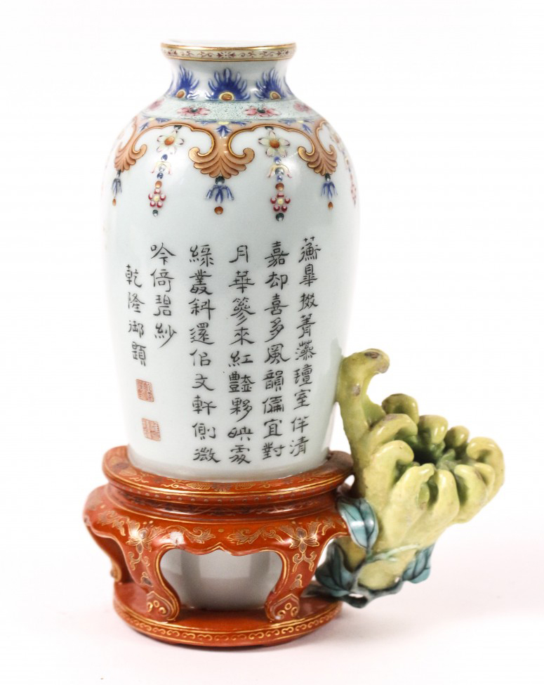 Chinese porcelain hand-painted wall pocket from the late 19th or early 20th century, 6 3/4 inches tall, with four-character cobalt underglaze Qianlong Nian Zhi mark. Price realized: $50,000. Ahlers & Ogletree Auction Gallery images