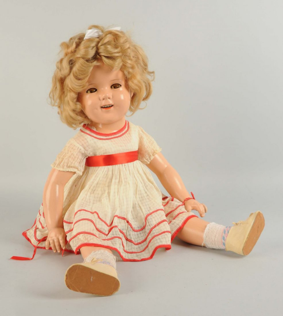 Ideal composition Shirley Temple doll, 27 inches tall, original wig, est. $300-$500 Morphy Auctions image