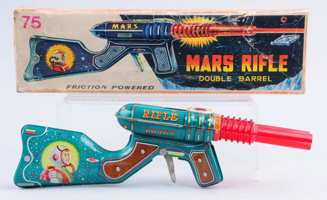 From a small collection of space guns, mostly boxed, comes this tin-litho friction Mars Rifle with Double Barrel, est. $75-$175. Morphy Auctions image