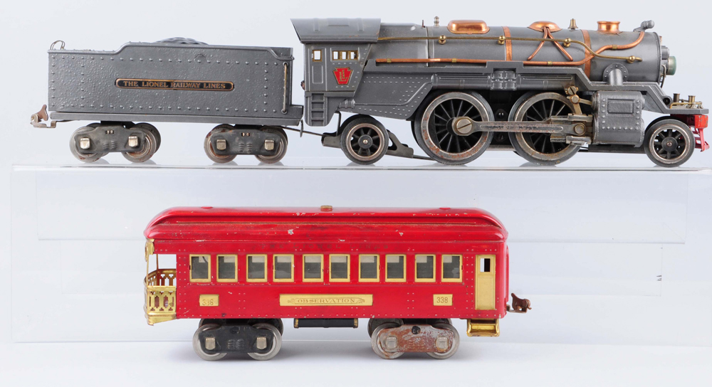 Lionel 385 steam locomotive with 1835 cast tender and 338 red observation car, est. $200-$300. Morphy Auctions image