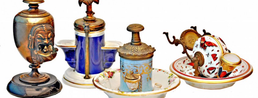 A group of porcelain-bodied inkwells, pick of which is the cobalt blue example, second from the left, was made in Birmingham, England, by Joseph Schlesinger. Photos by Jim Marshall