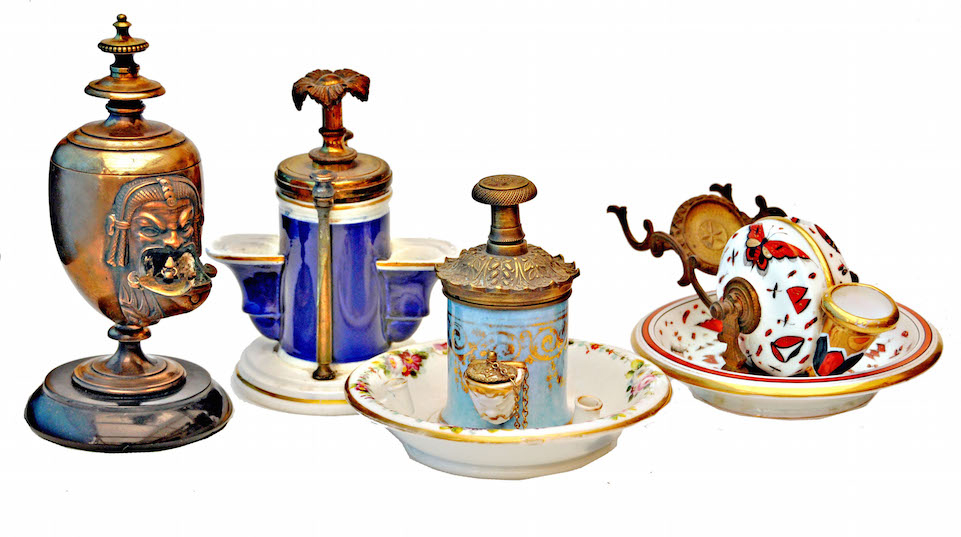 A group of porcelain-bodied inkwells, pick of which is the cobalt blue example, second from the left, was made in Birmingham, England, by Joseph Schlesinger. Photos by Jim Marshall