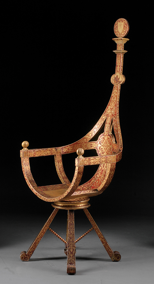 This is a rare Venetian gondola chair made in the 19th century. It's carved and painted with gilt on a red background. The chair seat rests on a swivel 