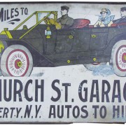Scarce Ithaca Sign Works (Ithaca, N.Y.) tin sign with Locomobile Touring Car image, 48 inches by 73 inches. Price realized: $10,080. Showtime Auction Services images