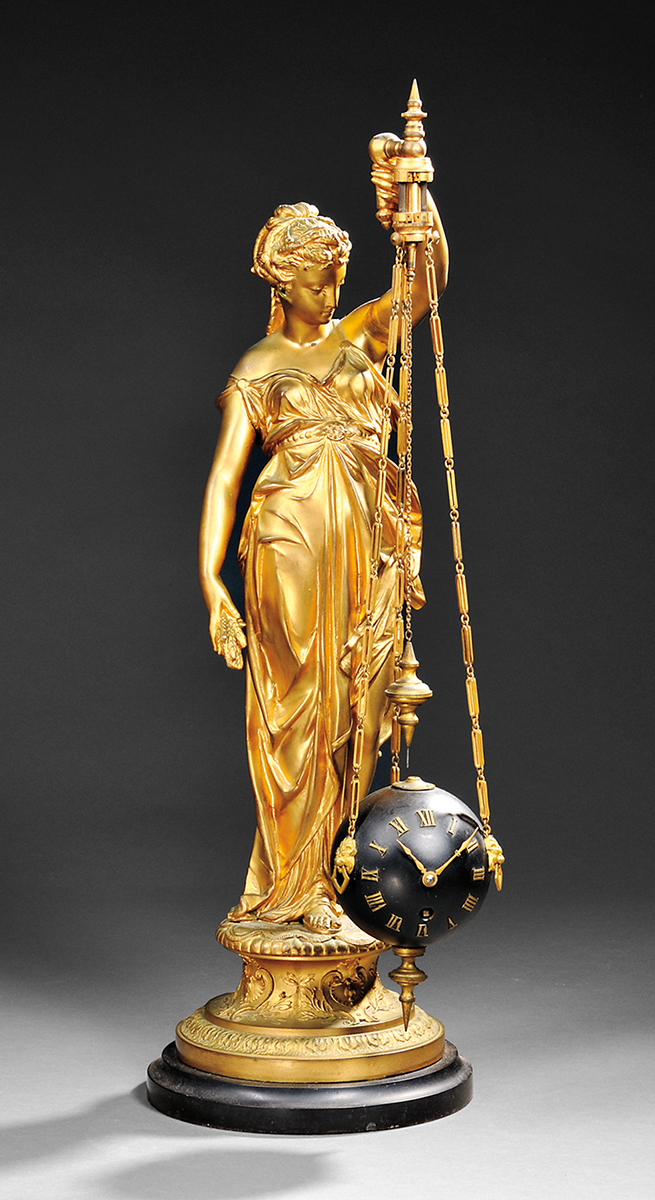 The gilt Ceres, goddess of agriculture, holds a suspended clock that appears to be running without any power source. She is 28 inches high. The clock, made about 1890 in France, was sold by Skinner Auctions of Boston for $5,843.