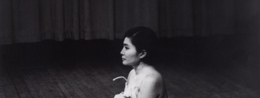 'Cut Piece' (1964) performed by Yoko Ono in New Works of Yoko Ono, Carnegie Recital Hall, New York, March 21, 1965. Photograph by Minoru Niizuma. © Minoru Niizuma. Courtesy Lenono Photo Archive, New York