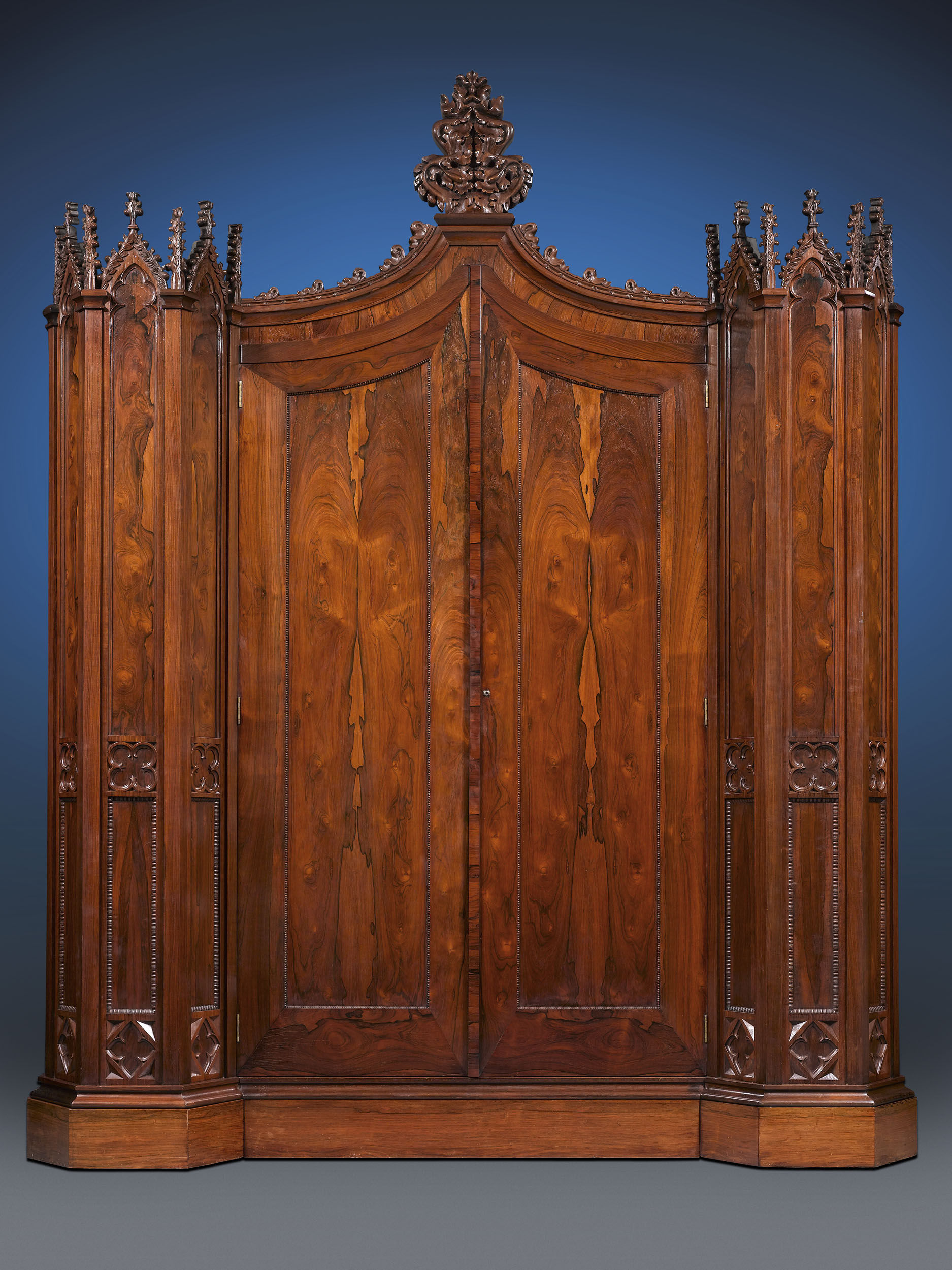The Henry Clay Rosedown Plantation Armoire is a rare and monumental Gothic Revival Rosewood 'winged' armoire made by Crawford Riddell of Philadelphia for the White House. M.S. Rau Antiques images