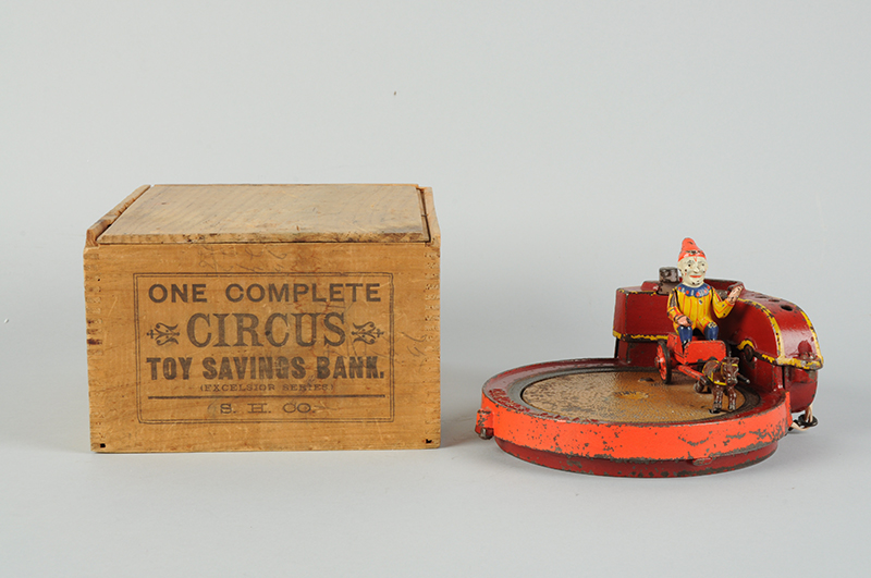 Shepard Hardware ‘Circus’ cast-iron mechanical bank with rare original factory wood box, $16,200. Morphy Auctions image