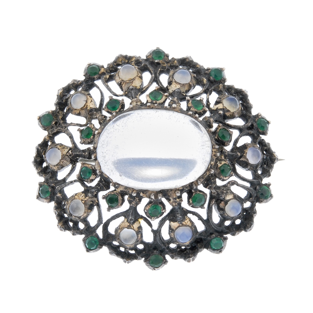 This silver moonstone and chalcedony brooch is included in a collection of Sibyl Dunlop jewelry. Fellows image