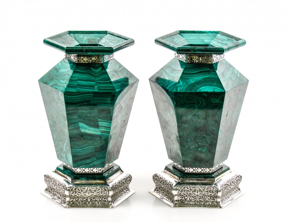 This pair of English 20th century malachite and sterling silver vases, each 13 1/4 inches tall, realized: $13,000. Ahlers & Ogletree image