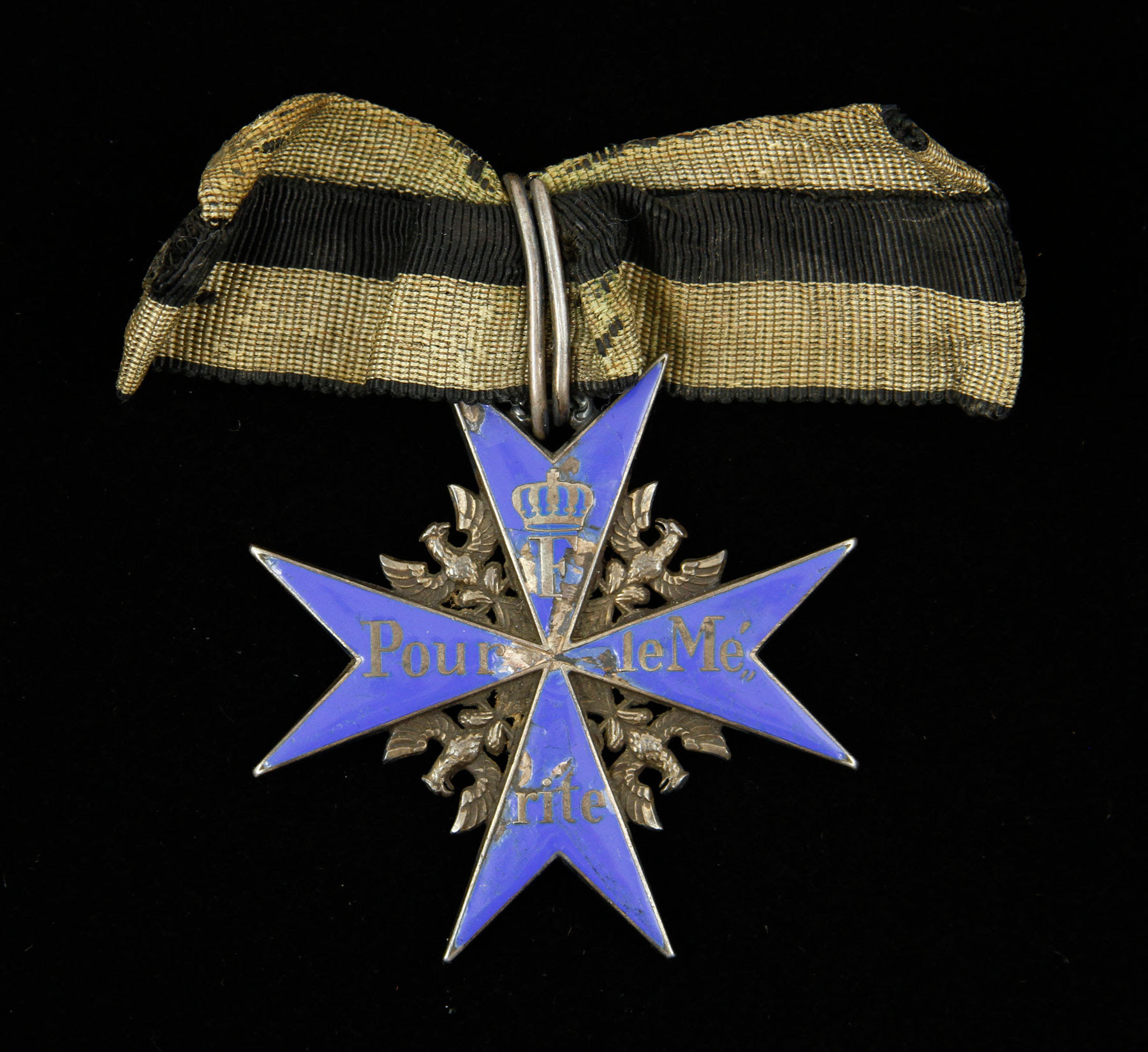 Once awarded to a German flying ace, the Pour le Merite Blue Max medal sold for $28,800. Kaminski Auctions image