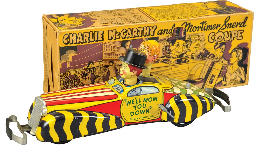 Louis Marx ‘Charlie McCarthy and Mortimer Snerd Coupe,’ tin, original box, $5,900. Bertoia Auctions image