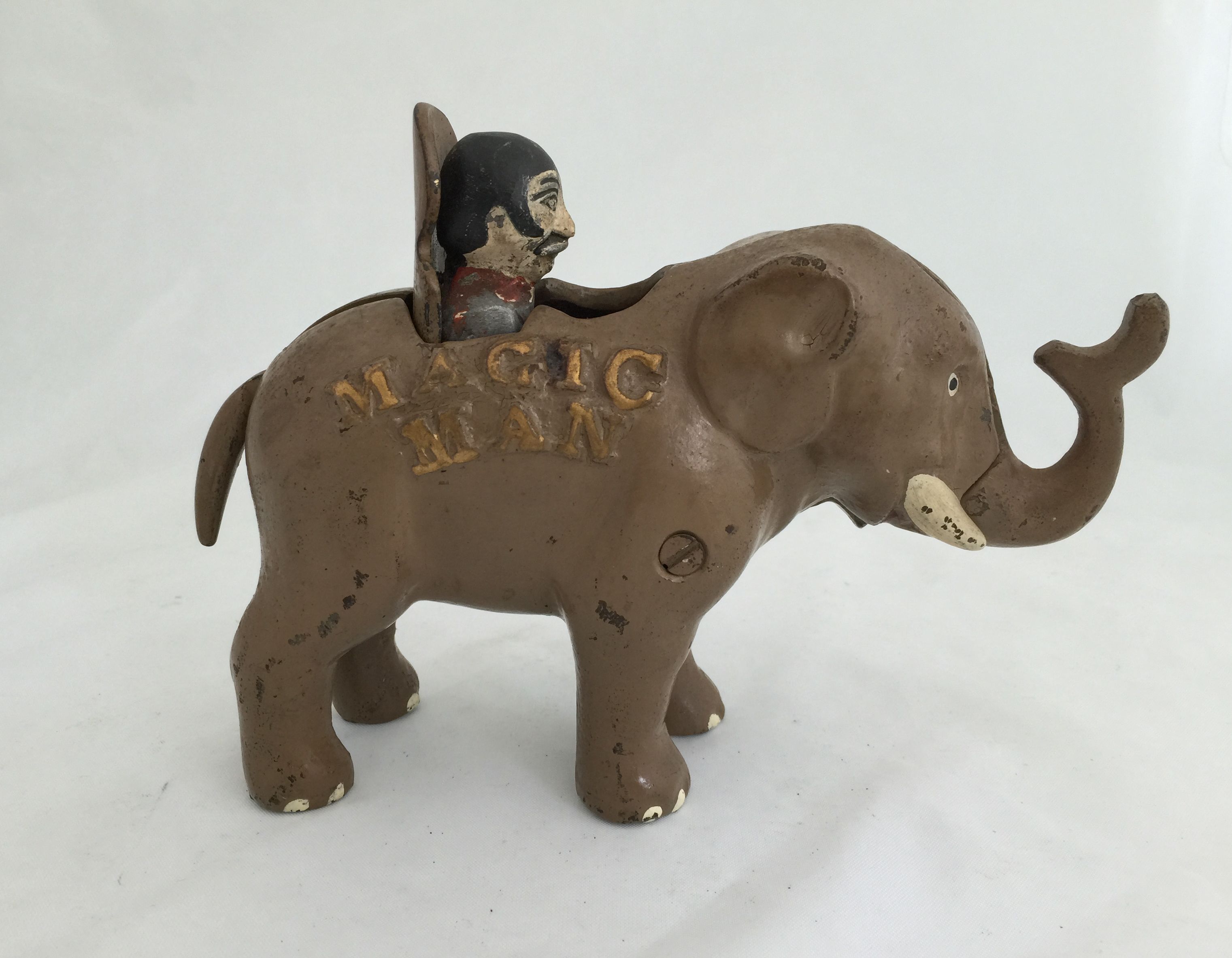 Magic Man cast-iron mechanical bank, only known example. RSL Auction image