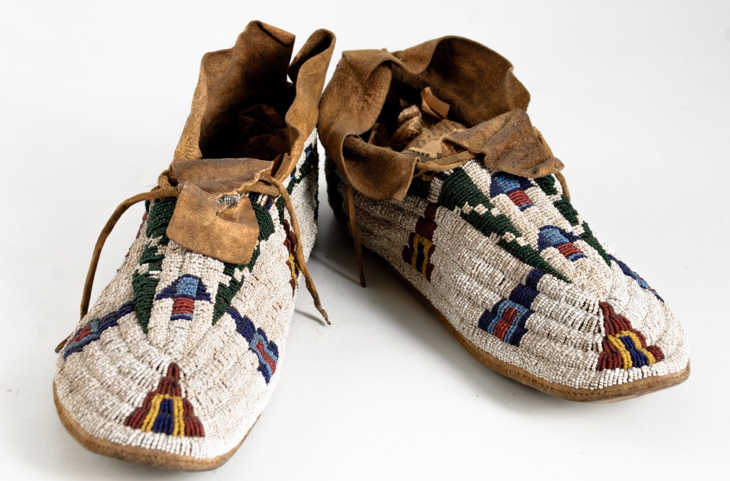 Early beaded American Indian moccasins, 10 3/4in long (est. $300-$500). John McInnis Auctioneers image