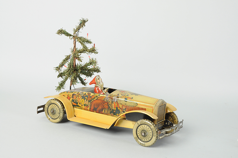 Tippco Santa Car with original Christmas feather tree cargo, $30,000. Morphy Auctions image