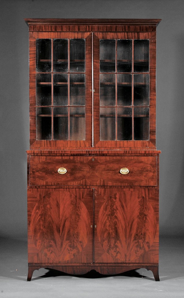 A collector will enjoy this bookcase-cabinet because it has several sizes of sections for antiques and collectibles. Neal Auction Co. of New Orleans sold it for $5,490.