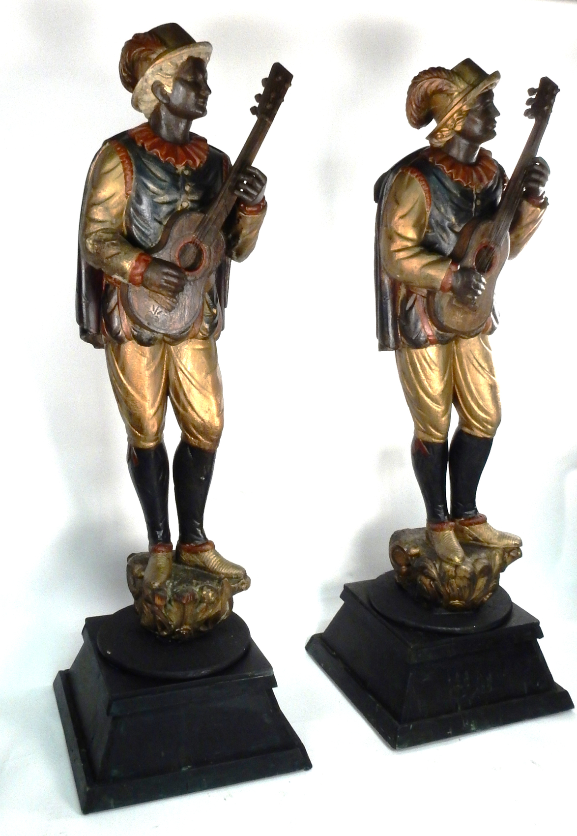 A pair of antique carved figures from Bill's Gay Nineties, 80 inches high (est. $15,000-$20,000.) Roland Auctions NY image