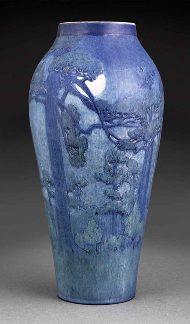 Rare and monumental Newcomb College art pottery scenic landscape vase, 1925, decorated by Henrietta Bailey in the Tall Pine and Moon design, 16in high. Price realized: $22,705. Neal Auction Co. image