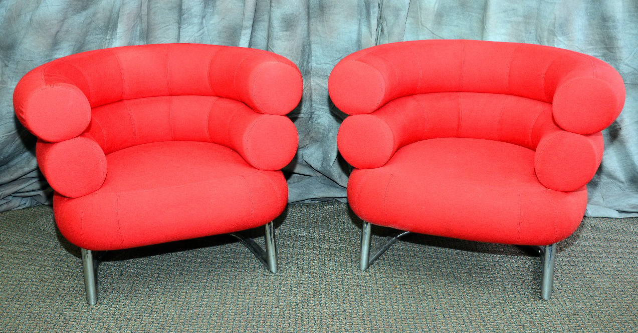 A pair of Bibidium chairs in red wool, in the design of Eileen Gray, will be sold as one lot. The Specialists of the South Inc. image