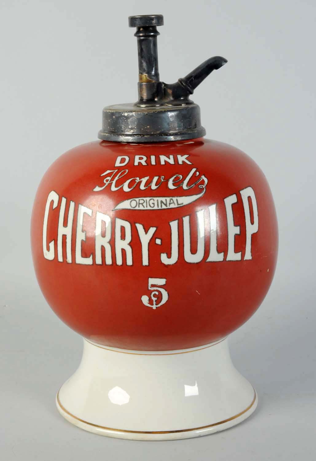 Cherry-Julep ceramic syrup dispenser, est. $1,500-$2,500. Morphy Auctions image