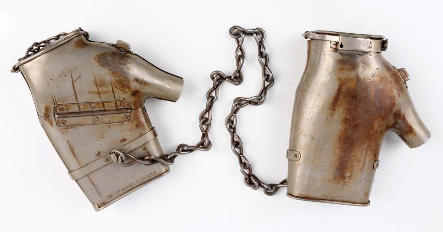McKenzie Mitts hand restraints, patented 1925, from collection of escape artist Earl Lockman (1893-1967), est. $2,000-$4,000. Morphy Auctions image