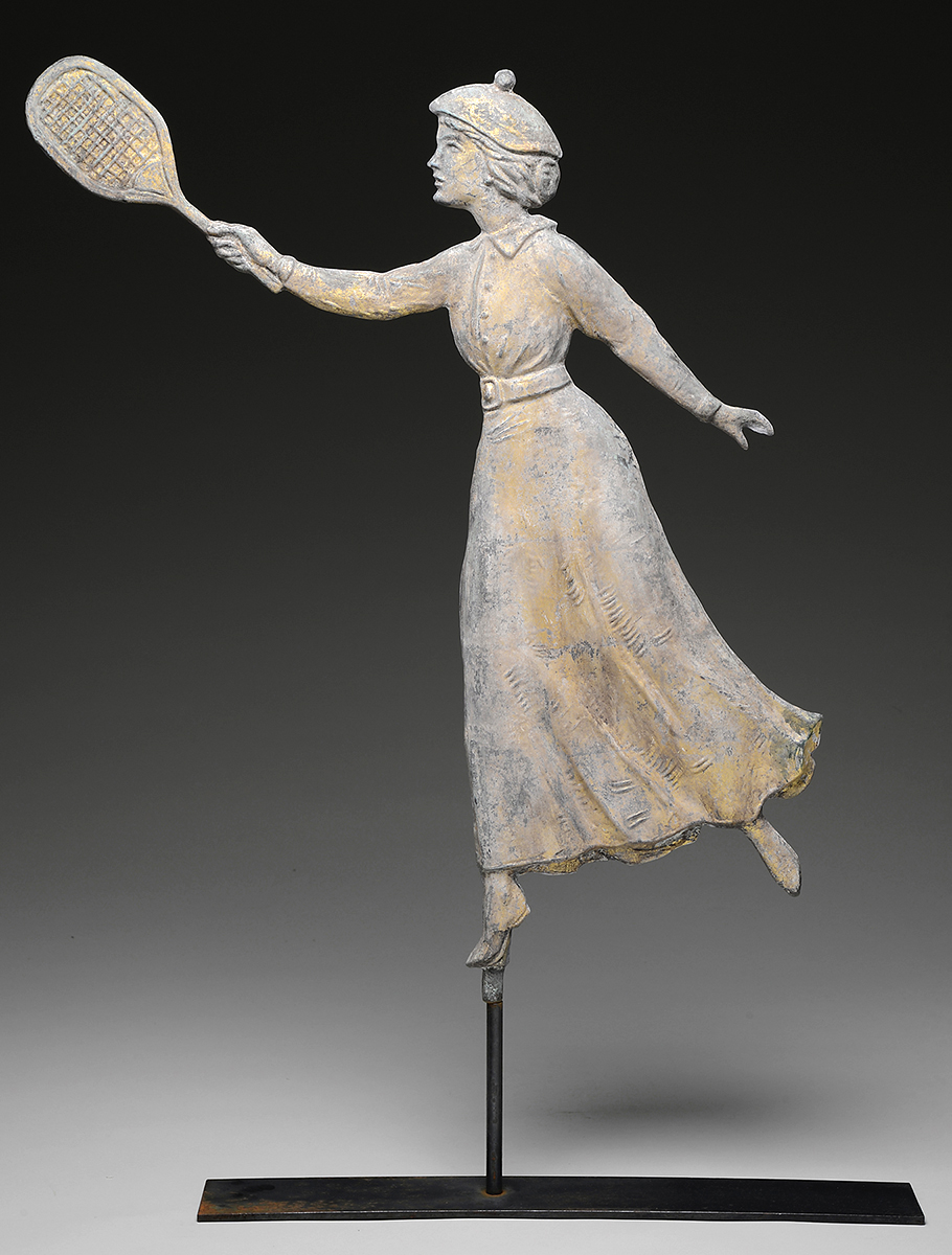 The woman playing tennis sported the appropriate dress for an early 20th-century athlete. The 28-inch-high copper weather vane sold last year for $7,110 at a James Julia sale in Fairfield, Maine. Photo Courtesy of James D. Julia Auctioneers, Fairfield, Maine.