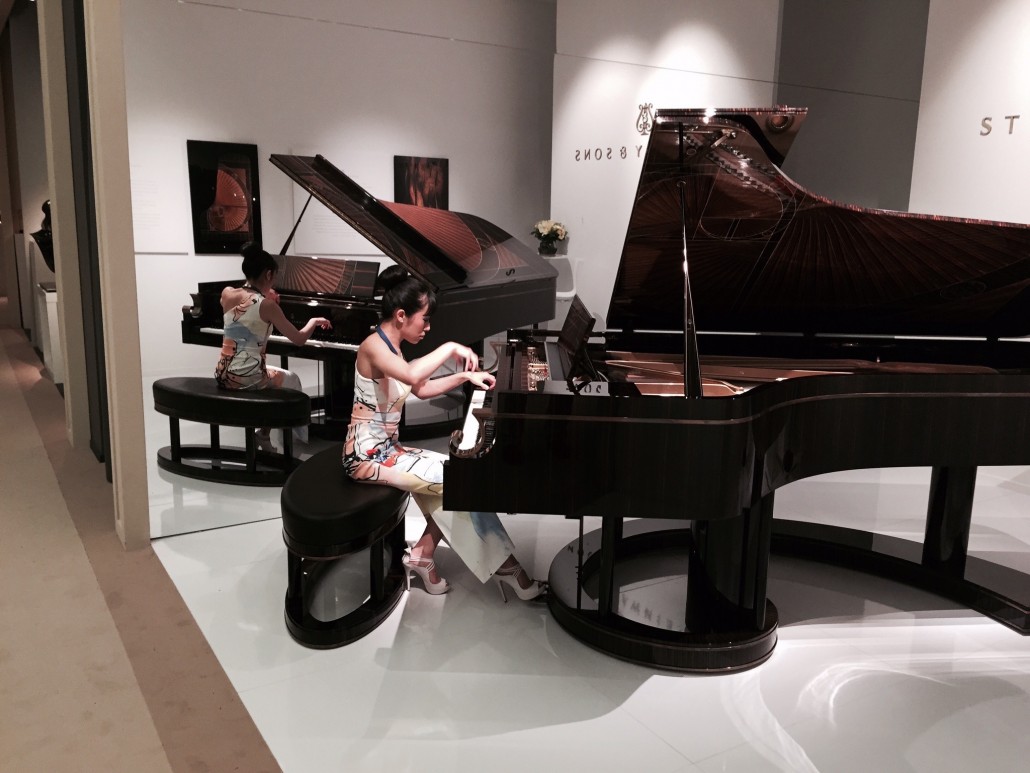 Steinway concert pianist Aijsa enchanting visitors at the Masterpiece fair with a tune on ‘The Fibonacci,’ a unique  instrument to mark the company’s 600,000th piano. It was priced at £1.85 million ($2.9m). Image Auction Central News.  