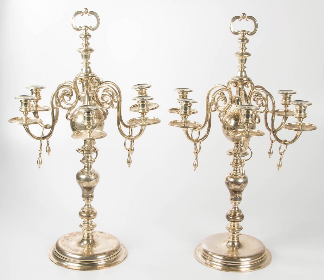 A fine pair of Thomas Bradbury & Sons, Sheffield, sterling silver candelabra, circa 1930, made for the Scott family of Richmond, Va., and modeled after 17th-century examples from a Scottish castle, achieved $18,400. Jeffrey S. Evans & Associates image