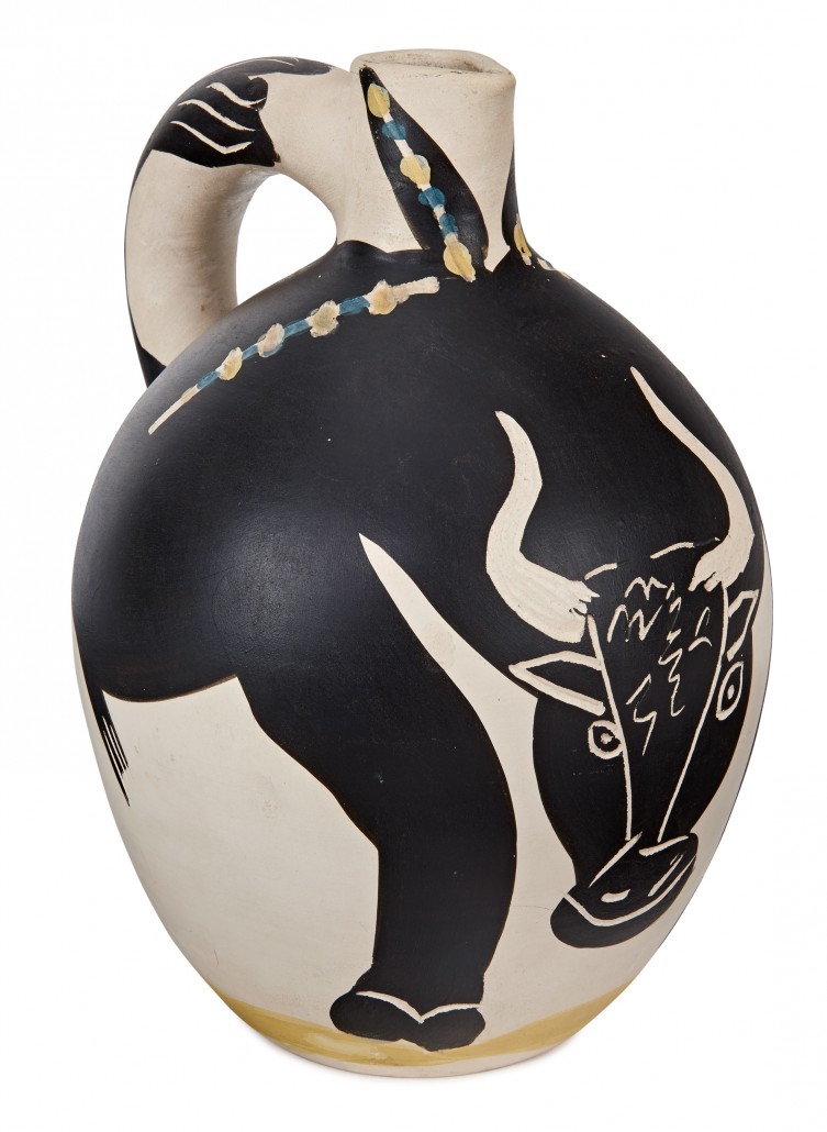Picasso drew many themes from the corrida de toros, sometimes focusing on the bull itself, sometimes on the contest in the ring. The bull is painted to conform to the rounded earthenware jug (H. 12in) with the tail continuing up the handle. This example of a 1955 design is #7 from an edition of 100. Photo courtesy of Los Angeles Modern Auctions (LAMA).