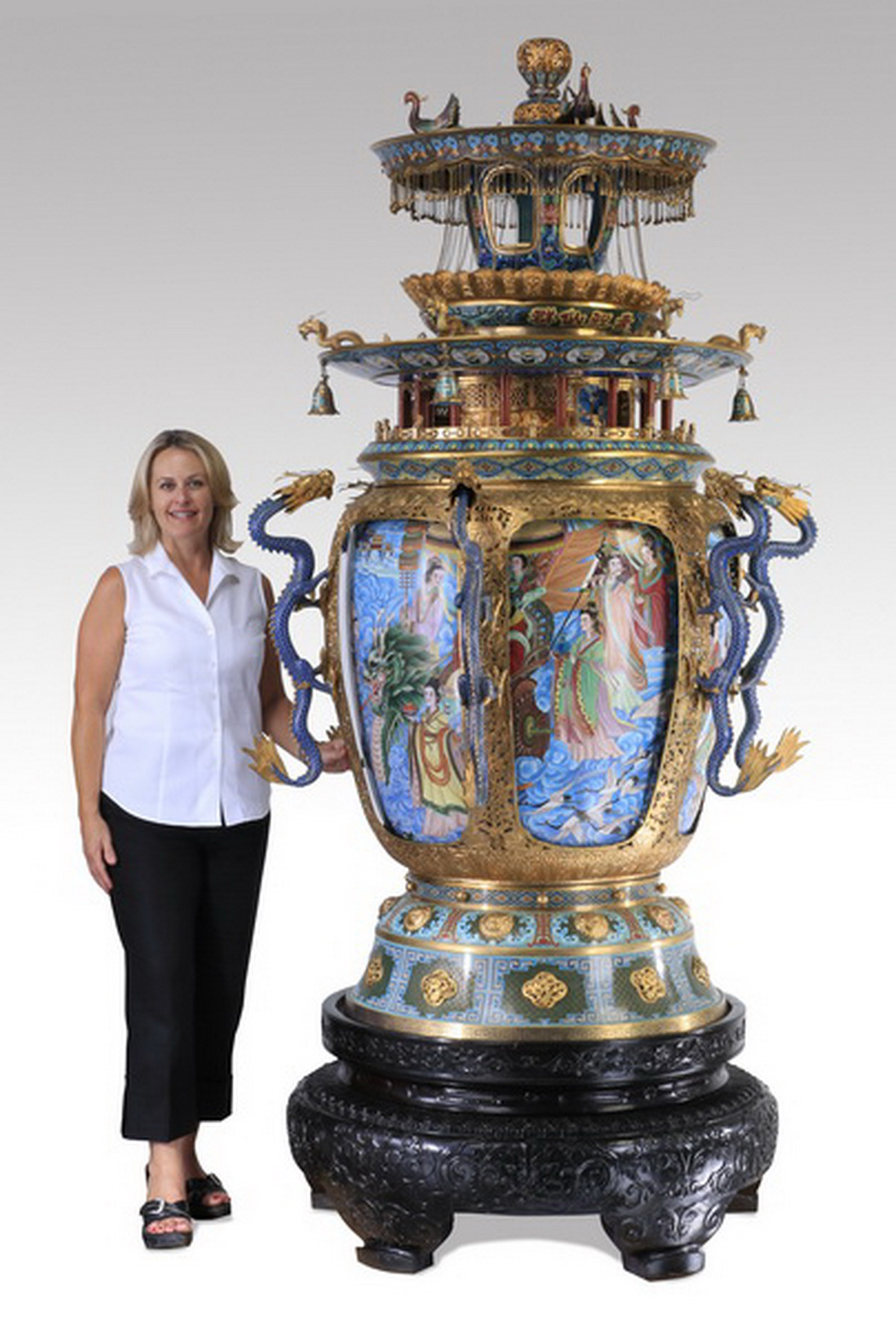 Finely detailed and palace-size Chinese enamel cloisonné and gilt metal censor, standing a staggering 96 inches tall. Great Gatsby’s Auction Gallery image