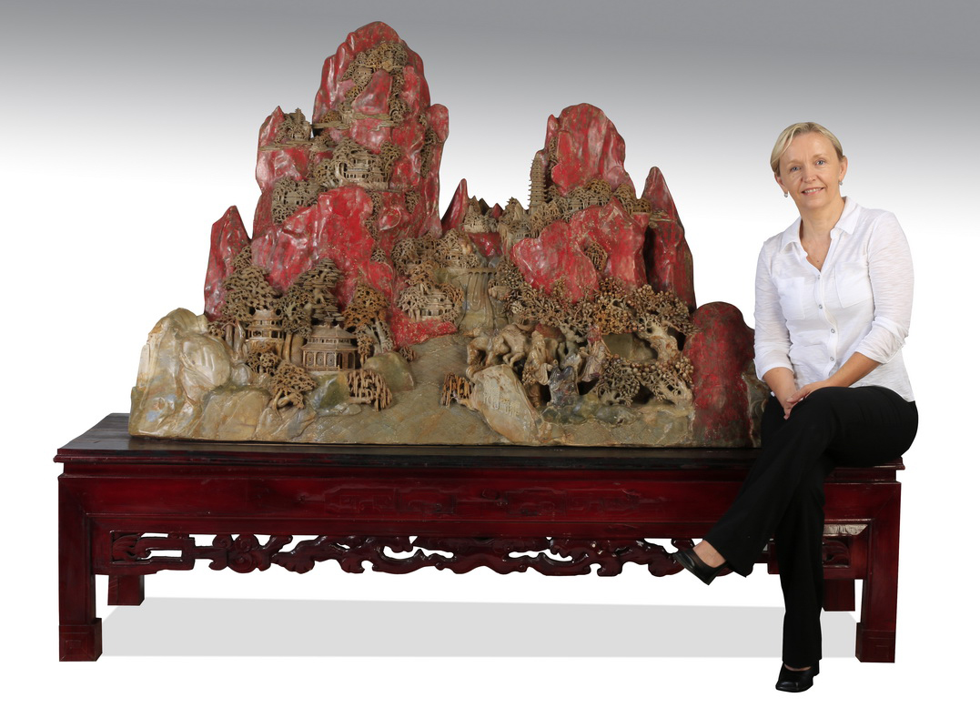 Large Chinese sculpture of finely carved soapstone and applied agate, depicting a mountainous landscape with temples and pagodas. Great Gatsby’s Auction Gallery image