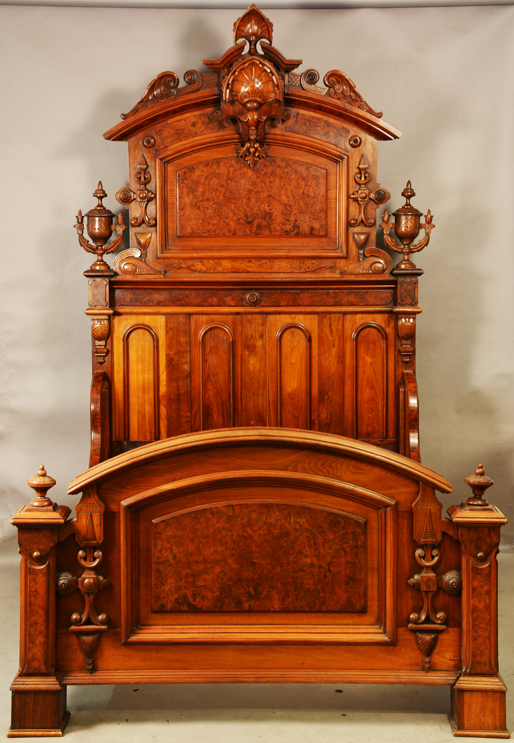American Renaissance revival walnut bedroom set, four-pieces with high-back headboard having a shell-carved crest, raised burl panels and turned finial. Estimate: $4,000-$7,500. Bruhns Auction Gallery image